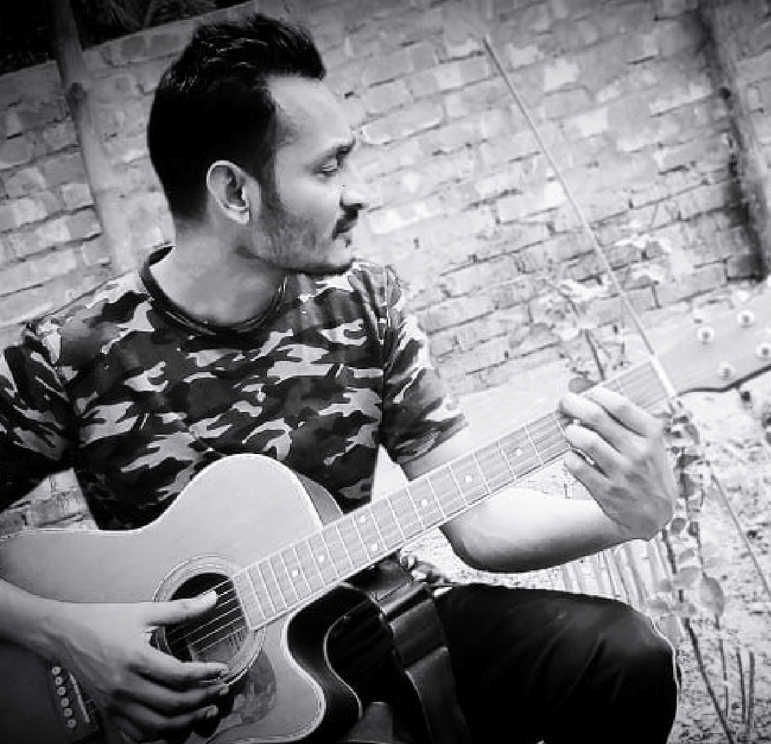 Sohel Farazy playing guitar – creative side of Local SEO expert